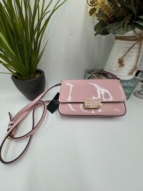 Kate Spade Reegan Patent Mini Flap Crossbody in Tutu Pink